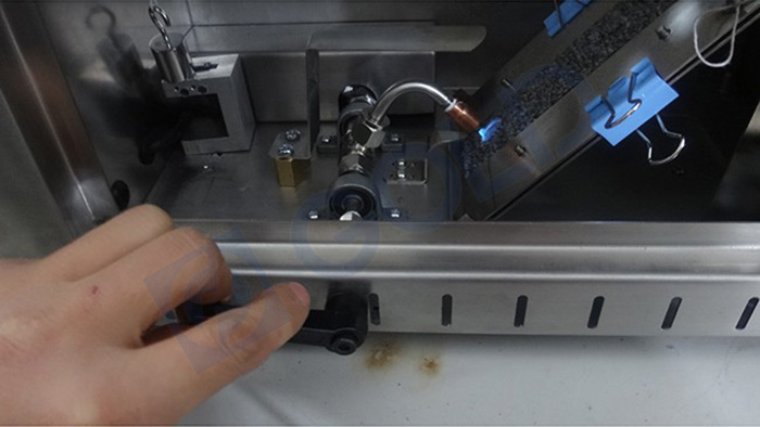 Probador de tasas de diferencia de llama de 45 grados textiles